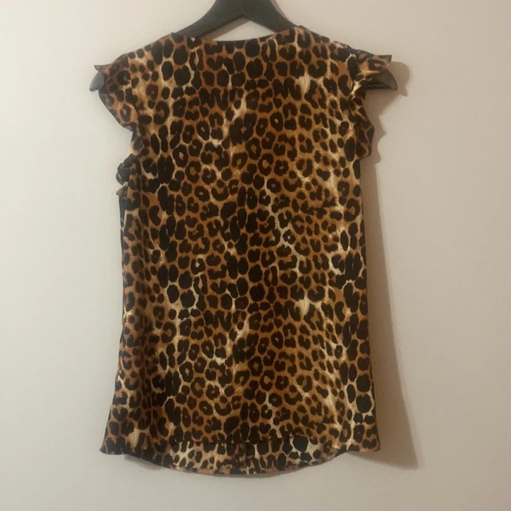 Express leopard sleeveless top. Black and brown cheetah print. Ruffle at sleeve. - Picture 3 of 3